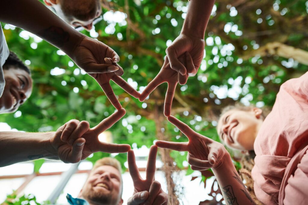 A group making a star with their fingers, symbolizing the superstar HSAFP Chapter Officers!