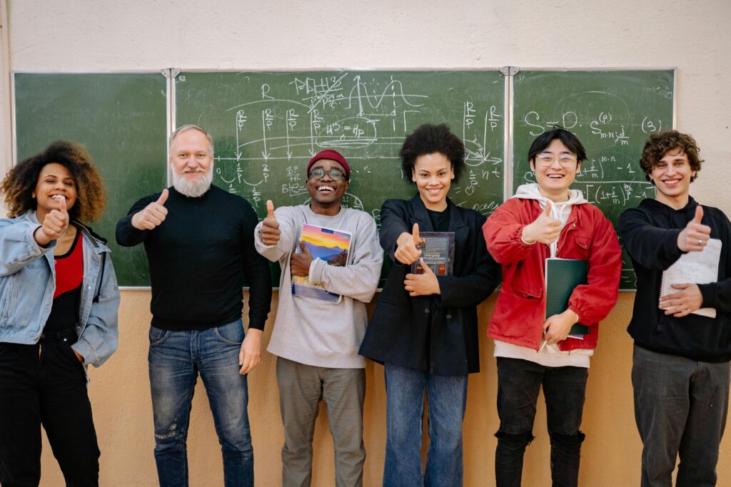 Six people giving the thumb's up to the camera, to indicate you're doing a great job as HSAFP Officer Members.