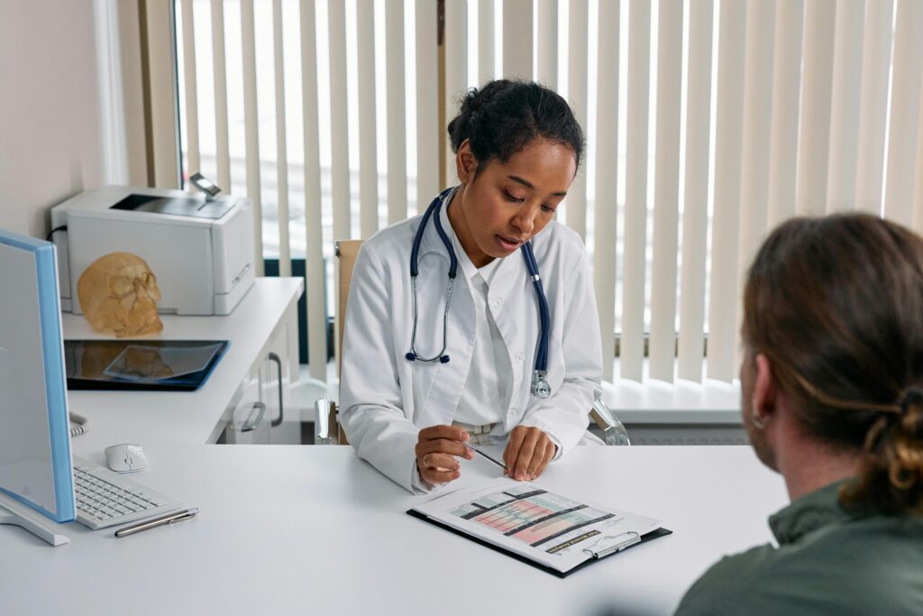 A physician making decisions with a patient.